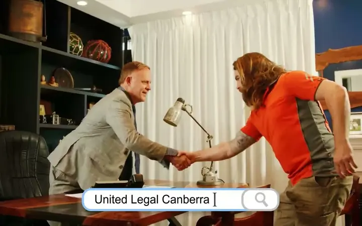 A United Legal lawyer shaking hands with an injured tradie, from our workers compensation video