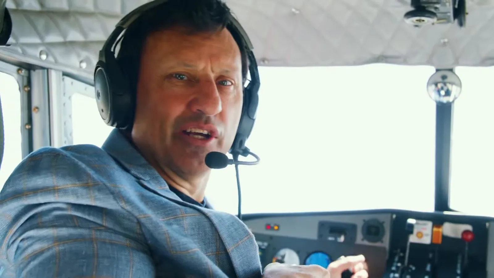 Pilot in a small plane cockpit, airline and travel injury claims